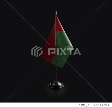 Small national flag of the Burkina Faso on a black background 98211263