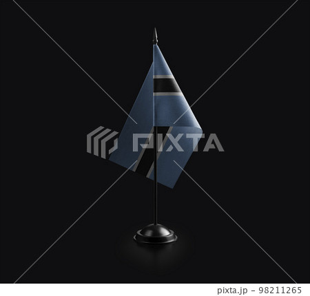 Small national flag of the Botswana on a black background 98211265