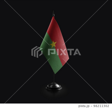 Small national flag of the Burkina Faso on a black background 98211302