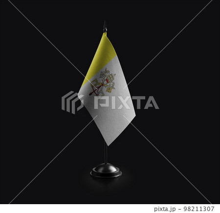 Small national flag of the Vatican on a black background Small national flag of the Vatican on a black background 98211307