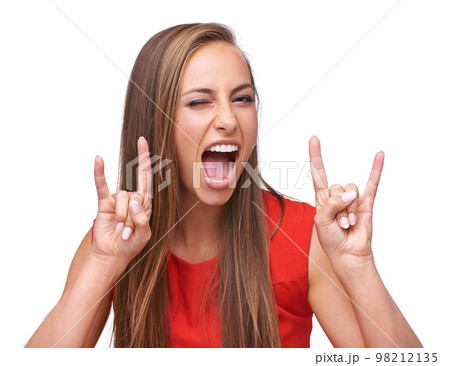 Rock, hand sign and portrait of woman on a white background for freedom, energy and heavy metal music. Comic, emoji and face of girl isolated in studio for rock and roll gesture, punk and attitude 98212135