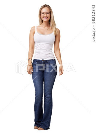 Woman, full body studio portrait and fashion with smile, glasses and happiness by white background for style. Confident model, isolated and jeans for trendy, edgy and pretty clothes with wellness 98212843