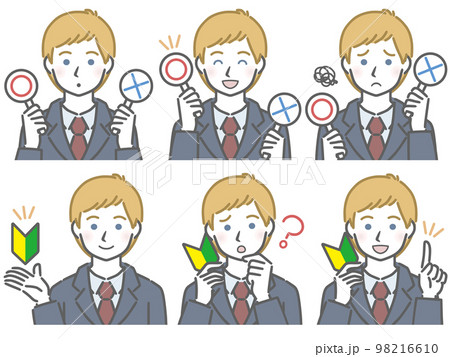 〇✕マークや初心者マークを持つ、スーツを着た若い白人男性 98216610