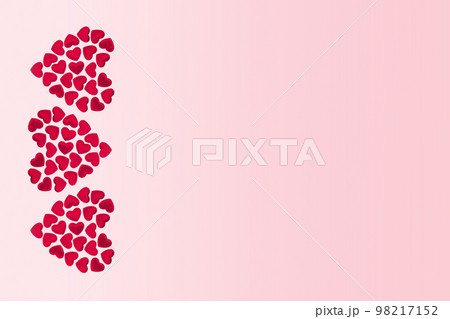 St Valentines day or thank you concept. Many magenta red hearts form three bigger heart shapes flat lay border on pink gradient banner. Love or wedding concept edgeless St Valentines day or thank you concept. Many magenta red hearts form three bigger heart shapes flat lay border on pink gradient banner. Love or wedding concept edgeless 98217152
