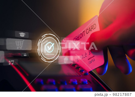Hand using credit card and pay on card reader machine with media icon, Online shopping concept. Hand using credit card and pay on card reader machine with media icon, Online shopping concept. 98217807