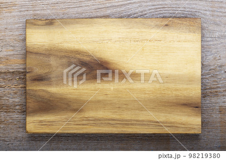 Chopping kitchen boards on a wooden background. Top view flat lay. 98219380