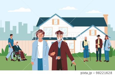 Nursing home center for retired people. Building exterior with garden where old people walking with medical workers 98221628