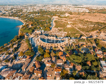 The Ancient City of Side. Port. Peninsula. Turkey. Manavgat. Antalya. The largest amphitheater in Turkey. The main street of the ancient city. Mediterranean Sea. View from above The Ancient City of Side. Port. Peninsula. Turkey. Manavgat. Antalya. The largest amphitheater in Turkey. The main street of the ancient city. Mediterranean Sea. View from above 98225879