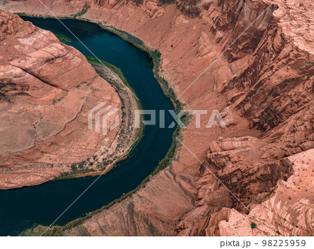 Panorama of Horseshoe Bend, Page Arizona. The Colorado River and a land mass made of orange sandstone. Made of twenty-three images, not one hundred percent accurate for perspective. Panorama of Horseshoe Bend, Page Arizona. The Colorado River and a land mass made of orange sandstone. Made of twenty-three images, not one hundred percent accurate for perspective. 98225959