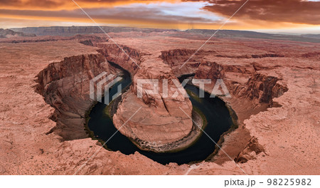 Panorama of Horseshoe Bend, Page Arizona. The Colorado River and a land mass made of orange sandstone. Made of twenty-three images, not one hundred percent accurate for perspective. Panorama of Horseshoe Bend, Page Arizona. The Colorado River and a land mass made of orange sandstone. Made of twenty-three images, not one hundred percent accurate for perspective. 98225982