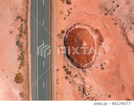 Northern Arizona highway through red rocks and landscape. Beautiful road trip through America near Monument Valley. 98226077