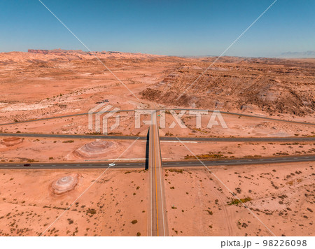 Panoramic image of a lonely, seemingly endless road in the desert of Southern Arizona. Beautiful desert in the middle of nowhere. Panoramic image of a lonely, seemingly endless road in the desert of Southern Arizona. Beautiful desert in the middle of nowhere. 98226098