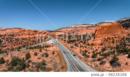 Panoramic image of a lonely, seemingly endless road in the desert of Southern Arizona. Beautiful desert in the middle of nowhere. 98226166