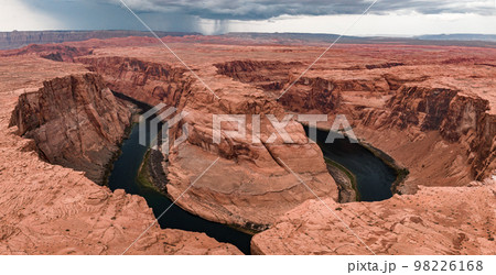 Panorama of Horseshoe Bend, Page Arizona. The Colorado River and a land mass made of orange sandstone. Made of twenty-three images, not one hundred percent accurate for perspective. 98226168