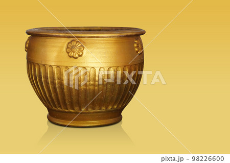 antique gold ceramic pot on yellow background, vintage, retro, antique, old, decor, copy space antique gold ceramic pot on yellow background, vintage, retro, antique, old, decor, copy space 98226600