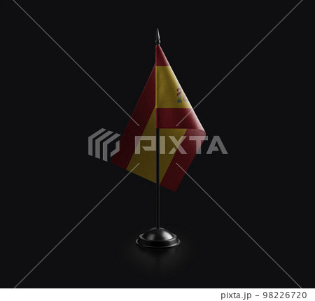 Small national flag of the Spain on a black background 98226720