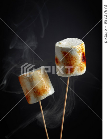 Toasted marshmallows with smoke. Toasted marshmallows with smoke. 98227673
