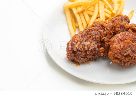 spicy Korean fried chicken with french fries spicy Korean fried chicken with french fries 98234010