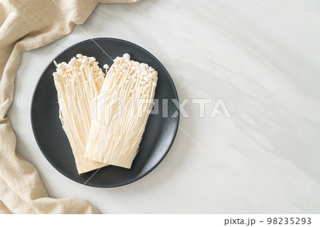 fresh enoki mushroom or golden needle mushrooms fresh enoki mushroom or golden needle mushrooms 98235293