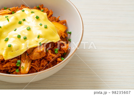 kimchi fried rice with pork and topped cheese 98235607