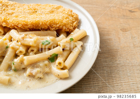 quadrotto penne pasta white cream sauce with fried fish 98235685