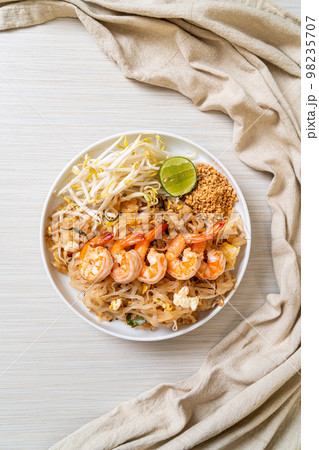 stir-fried noodles with shrimp and sprouts or Pad Thai stir-fried noodles with shrimp and sprouts or Pad Thai 98235707