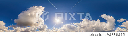 Blue sky panorama with puffy Cumulus clouds. Seamless hdr pano in spherical equirectangular format. Sky dome or zenith for 3D visualization, game and sky replacement for aerial drone 360 panoramas. 98236846