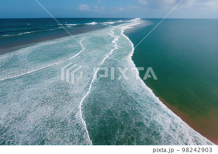 Spectacular aerial top view background photo of ocean sea water splashing. 98242903
