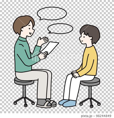 先生と面談する小学生くらいの子ども 先生と面談する小学生くらいの子ども 98244849