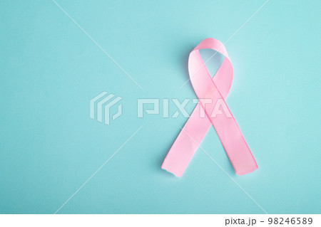 pink ribbon breast cancer on blue background pink ribbon breast cancer on blue background 98246589