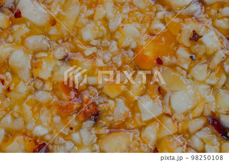 Close up: granola sesame hazelnuts bar, caramelized nuts - Gozinaki: top view 98250108
