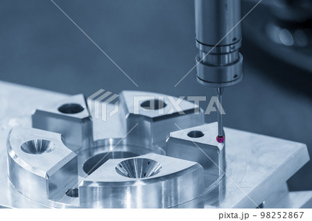 The CMM machine measuring the aluminum  parts. 98252867