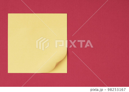Yellow sticky note on red background waiting for your message Yellow sticky note on red background waiting for your message 98253167