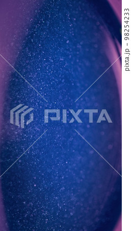 Defocused glitter texture. Bokeh light. Universe stardust. Blur neon blue pink color sparkle glow futuristic abstract background with free space. Defocused glitter texture. Bokeh light. Universe stardust. Blur neon blue pink color sparkle glow futuristic abstract background with free space. 98254233