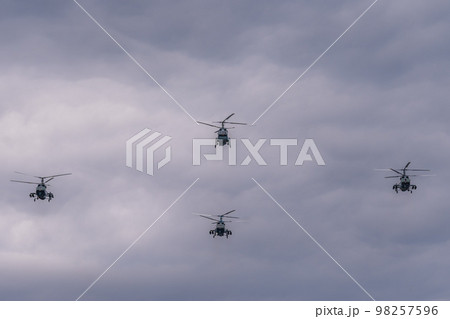 Russia. Kronstadt. July 31, 2022. A flight of Ka-31R and Ka-29 helicopters at the naval parade. Russia. Kronstadt. July 31, 2022. A flight of Ka-31R and Ka-29 helicopters at the naval parade. 98257596