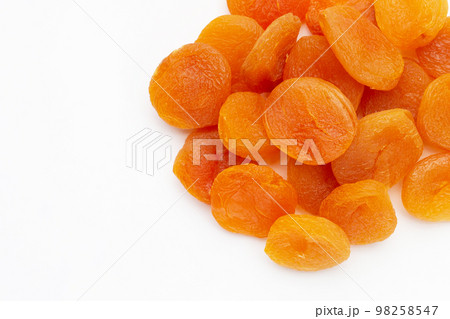 Dried apricots on white background. 98258547