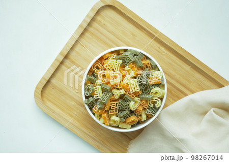 dry letter shape pasta close up  98267014