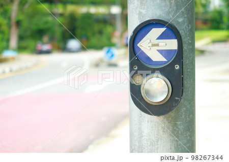 close up of crossing signal button in singapore  98267344