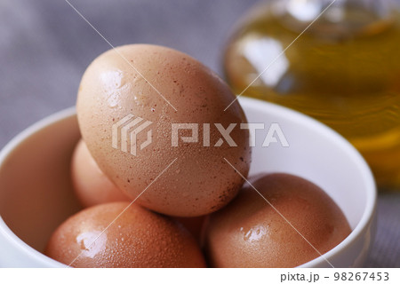 close up of eggs in a bowl. close up of eggs in a bowl. 98267453