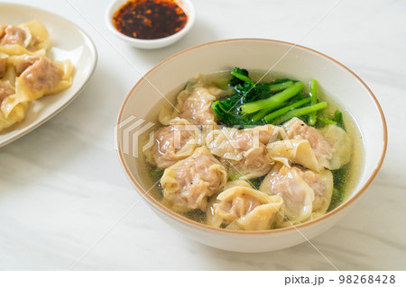pork wonton soup or pork dumplings soup with vegetable pork wonton soup or pork dumplings soup with vegetable 98268428