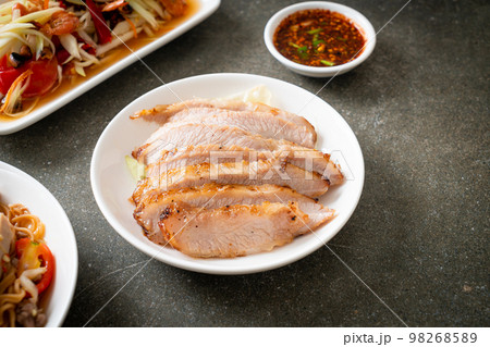 Thai Grilled Pork Neck with Spicy Dipping Sauce 98268589