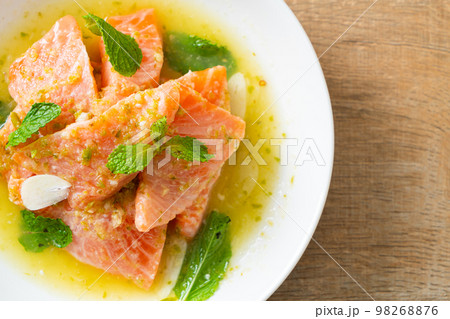 fresh salmon raw spicy seafood salad 98268876