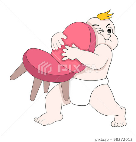 baby boy is doing funny behavior lifting a chair 98272012