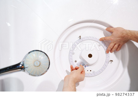 installation and connection of ring LED module. concept of modern lighting. 98274337