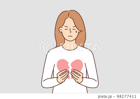Unhappy woman hold broken heart  98277411