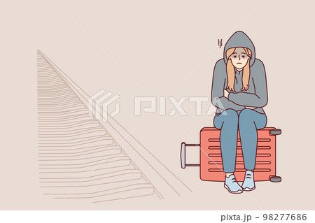 Tired woman sits on suitcase near railway waiting for train and freezes at station. Vector image 98277686