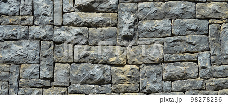 Sturdy blue and gray cut stone wall, seamless lined up 98278236