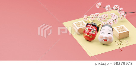 枡入りの豆と赤鬼・お多福のお面 / コピースペースのある節分用背景素材 98279978