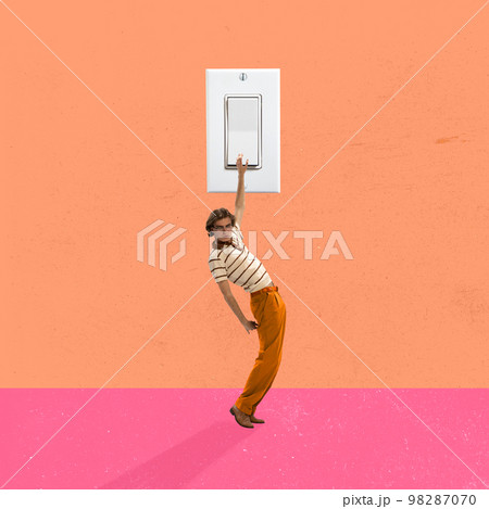 Young man presses a huge switch button. Contemporary art collage. Retro, vintage style. Minimalism. Old-fashioned and modern technology. Young man presses a huge switch button. Contemporary art collage. Retro, vintage style. Minimalism. Old-fashioned and modern technology. 98287070