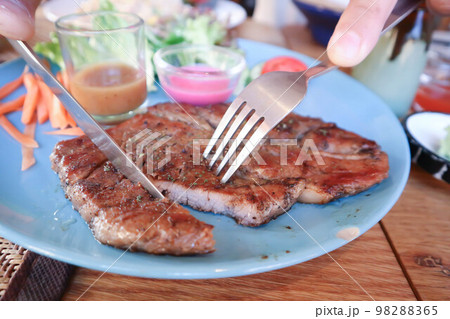 grilled pork or roasted pork , pork steak grilled pork or roasted pork , pork steak 98288365